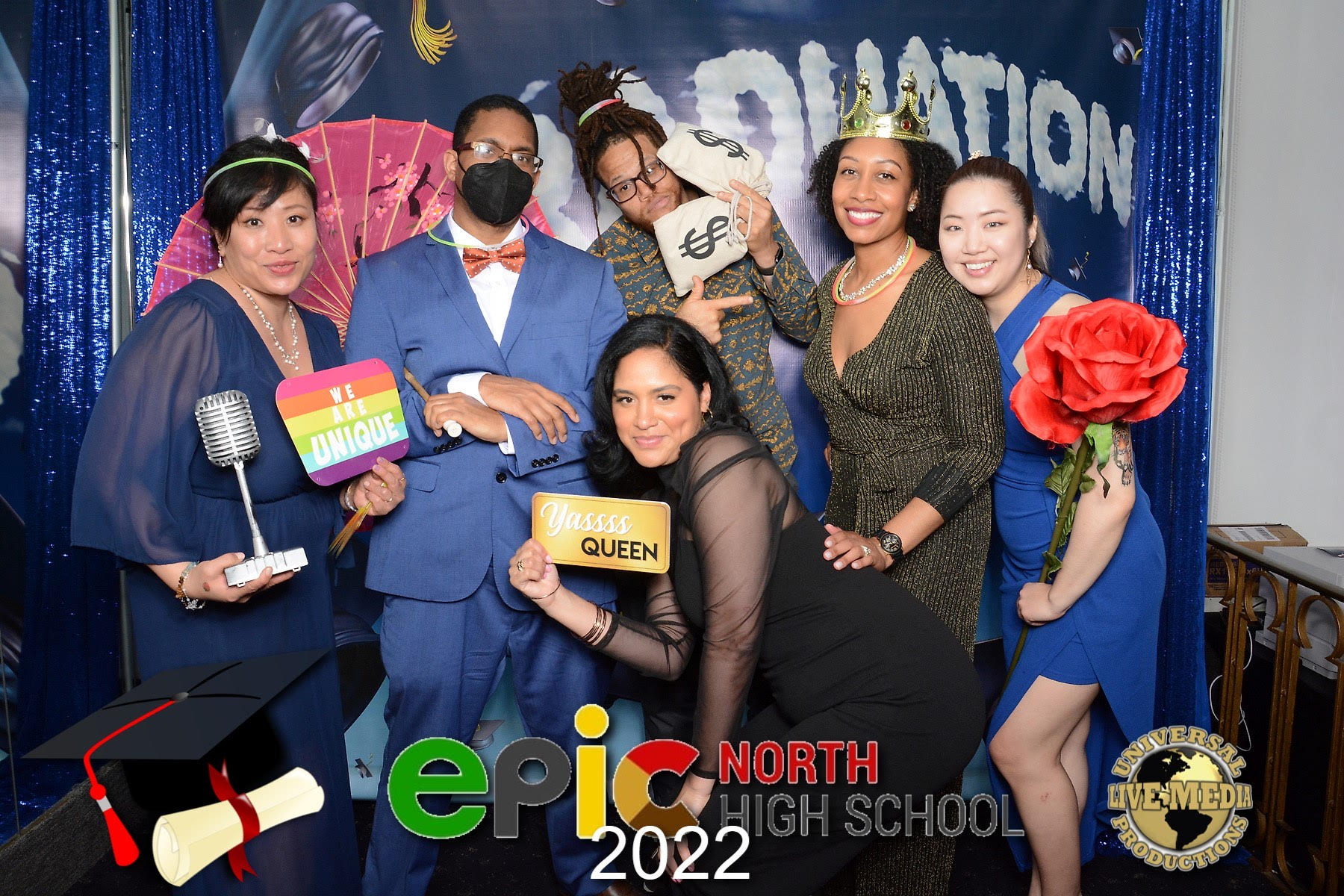 6 EPIC staff members (Vicky, Spellman, Fields, Darlene, Ms. A, and Ms. Lee) posing at together and holding up signs at 2022 Senior prom