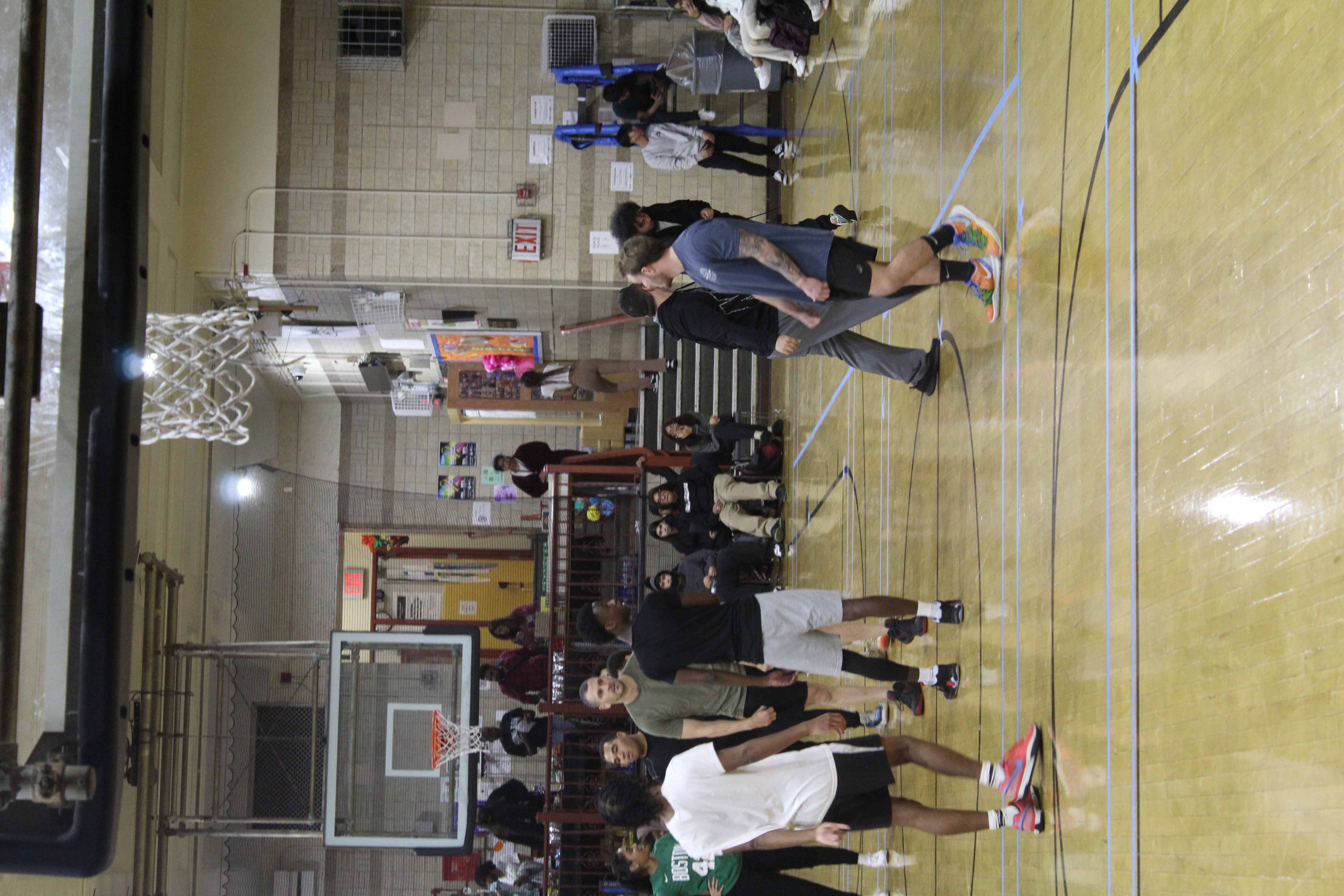 Seniors preparing to play against staff on the court